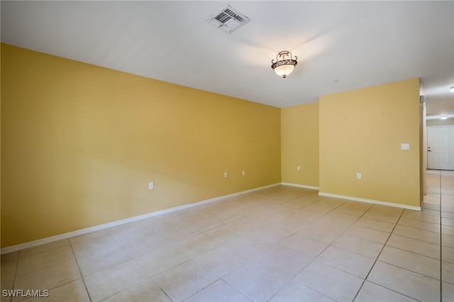 12021 Rock Brook Run Unit 2106, Fort Myers, FL 33913 - empty room with light tile patterned floors and baseboards