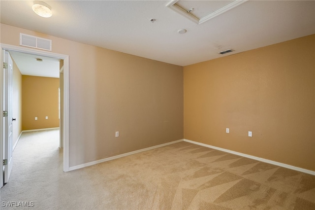 12021 Rock Brook Run Unit 2106, Fort Myers, FL 33913 - unfurnished room featuring light carpet, fire sprinkler in ceiling, and attic access