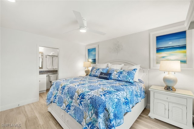 827 E Gulf Dr Unit C6, Sanibel, FL 33957 - bedroom featuring light wood-type flooring, ceiling fan, and ensuite bathroom