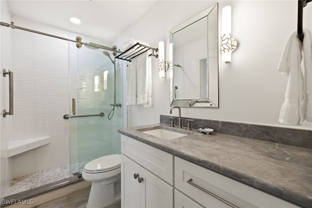 827 E Gulf Dr Unit C6, Sanibel, FL 33957 - bathroom with vanity, a shower stall, and recessed lighting