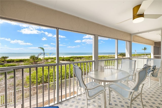 827 E Gulf Dr Unit C6, Sanibel, FL 33957 - sunroom / solarium with view of water and beach and healthy amount of natural light