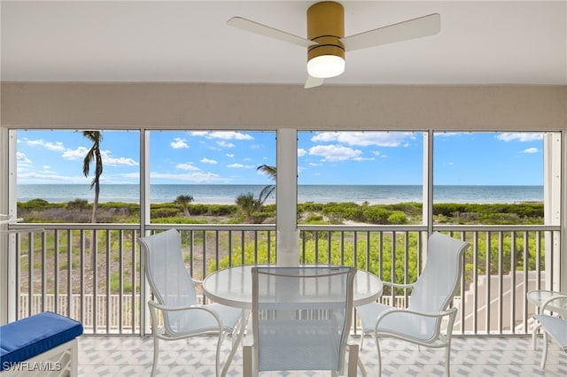 827 E Gulf Dr Unit C6, Sanibel, FL 33957 - sunroom with a water view and healthy amount of natural light