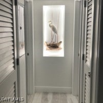 827 E Gulf Dr Unit C6, Sanibel, FL 33957 - doorway with baseboards