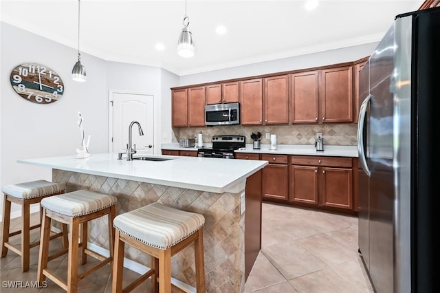 3742 Treasure Cove Cir, Naples, FL 34114 - kitchen with appliances with stainless steel finishes, a sink, backsplash, light countertops, and ornamental molding