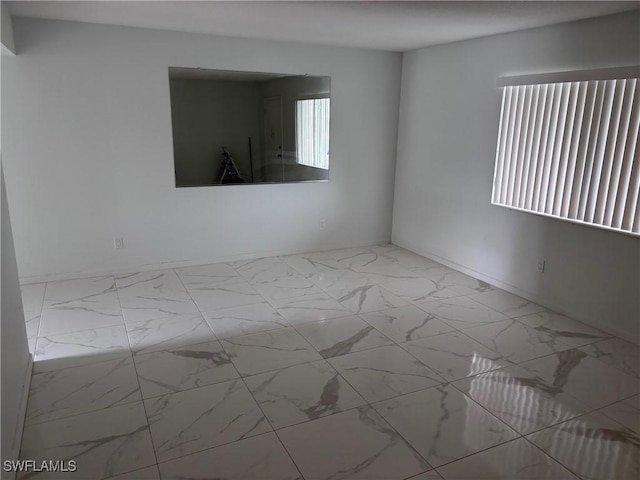 339 Joel Blvd Unit 221, Lehigh Acres, FL 33936 - unfurnished room with marble look tiles