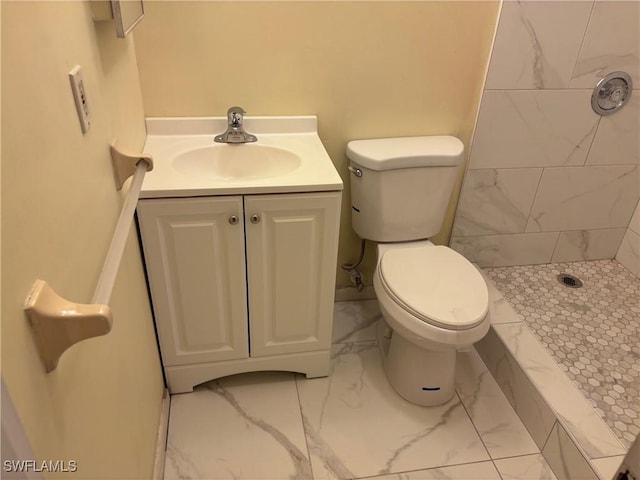 339 Joel Blvd Unit 221, Lehigh Acres, FL 33936 - full bathroom featuring marble look tiles, a tile shower, toilet, and vanity