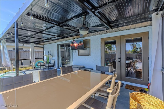 758 105th Ave N, Naples, FL 34108 - view of patio / terrace featuring french doors, outdoor dining area, and a ceiling fan