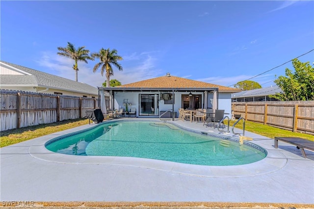 758 105th Ave N, Naples, FL 34108 - view of pool with a fenced backyard, a ceiling fan, and a patio