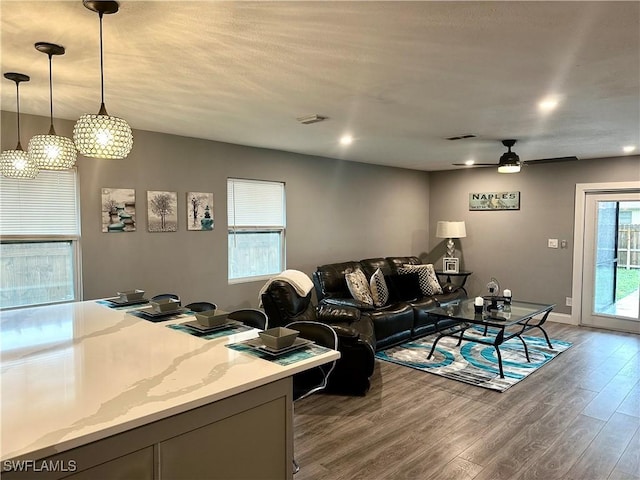 758 105th Ave N, Naples, FL 34108 - living room with wood finished floors and ceiling fan
