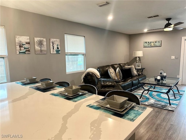 758 105th Ave N, Naples, FL 34108 - living room with wood finished floors and a ceiling fan