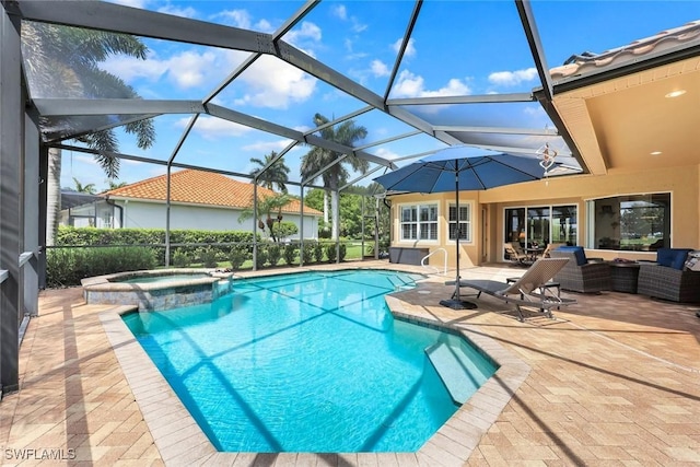 10026 Lions Bay Ct, Naples, FL 34120 - view of swimming pool with a pool with connected hot tub, a patio area, outdoor lounge area, and glass enclosure