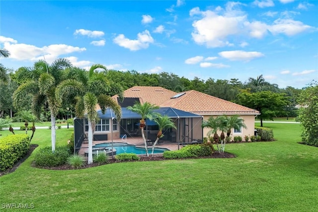 10026 Lions Bay Ct, Naples, FL 34120 - back of property featuring a yard, an outdoor pool, a lanai, a patio area, and a tile roof