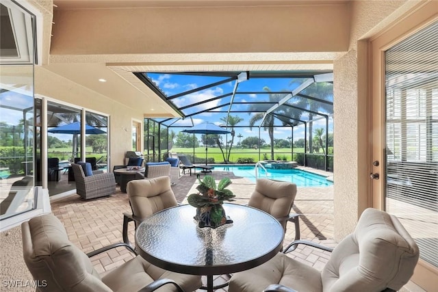 10026 Lions Bay Ct, Naples, FL 34120 - view of patio / terrace featuring glass enclosure, an outdoor hangout area, a pool with connected hot tub, and outdoor dining area