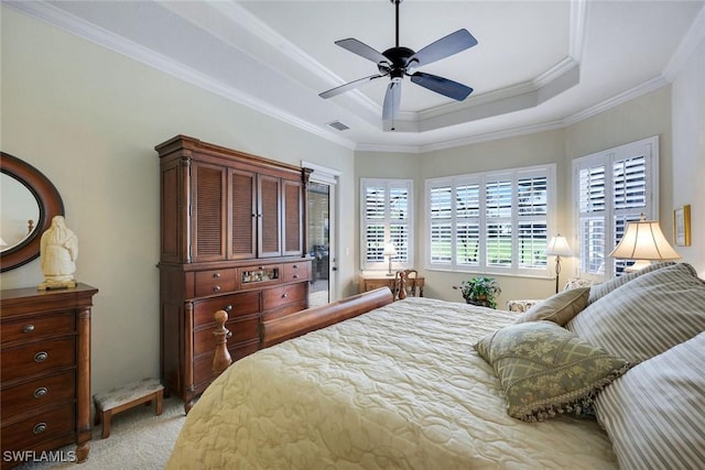 10026 Lions Bay Ct, Naples, FL 34120 - bedroom featuring crown molding, light colored carpet, a tray ceiling, and ceiling fan