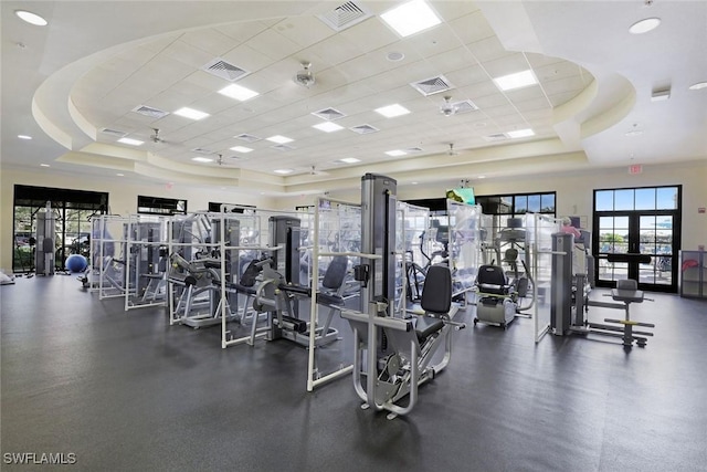 10026 Lions Bay Ct, Naples, FL 34120 - exercise room with a tray ceiling and a paneled ceiling