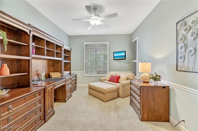 9121 Southmont Cv Unit 204, Fort Myers, FL 33908 - home office with ceiling fan, light carpet, built in desk, and baseboards