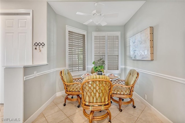 9121 Southmont Cv Unit 204, Fort Myers, FL 33908 - tiled dining room with a ceiling fan and baseboards