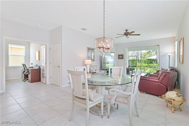 2113 Summersweet Dr, Alva, FL 33920 - dining room featuring a desk, a chandelier, light tile patterned flooring, and ceiling fan