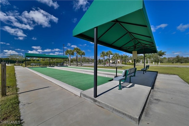 2113 Summersweet Dr, Alva, FL 33920 - view of community with a game area and a yard