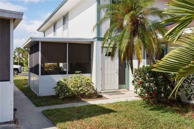 3297 Royal Canadian Trce Unit 2, Fort Myers, FL 33907 - entrance to property featuring stucco siding