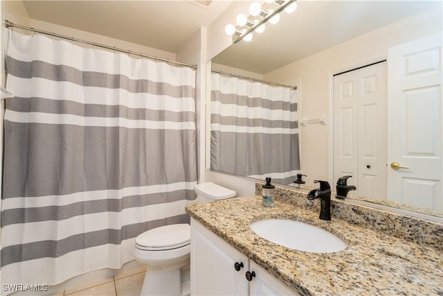 2768 Tiburon Blvd E Unit 202, Naples, FL 34109 - full bath with toilet, vanity, and tile patterned flooring