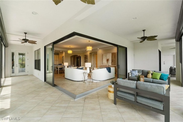 2768 Tiburon Blvd E Unit 202, Naples, FL 34109 - view of patio / terrace featuring ceiling fan, outdoor lounge area, and french doors