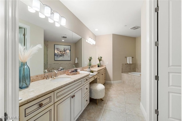 2768 Tiburon Blvd E Unit 202, Naples, FL 34109 - full bath with vanity, a garden tub, tile patterned floors, and baseboards