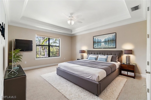 2768 Tiburon Blvd E Unit 202, Naples, FL 34109 - bedroom with a tray ceiling, light carpet, baseboards, crown molding, and ceiling fan