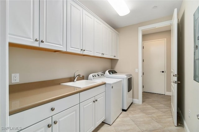 2768 Tiburon Blvd E Unit 202, Naples, FL 34109 - laundry room with separate washer and dryer, cabinet space, and baseboards