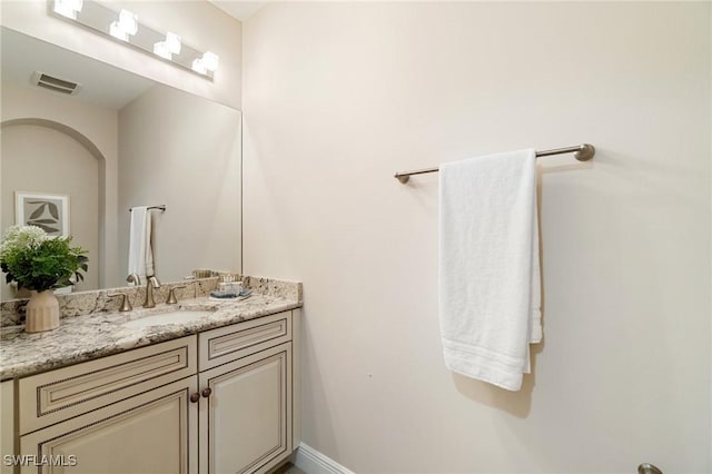 2768 Tiburon Blvd E Unit 202, Naples, FL 34109 - bathroom featuring vanity and baseboards