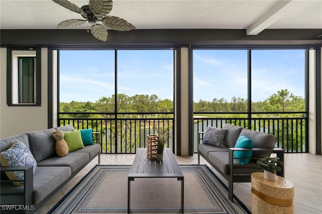 2768 Tiburon Blvd E Unit 202, Naples, FL 34109 - sunroom / solarium featuring an outdoor hangout area, ceiling fan, and beam ceiling