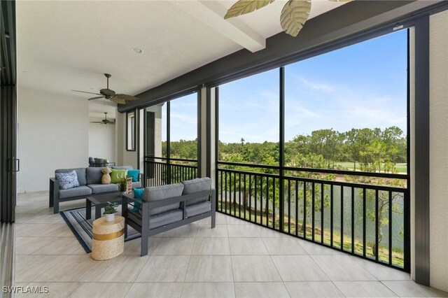 2768 Tiburon Blvd E Unit 202, Naples, FL 34109 - sunroom featuring a ceiling fan and healthy amount of natural light