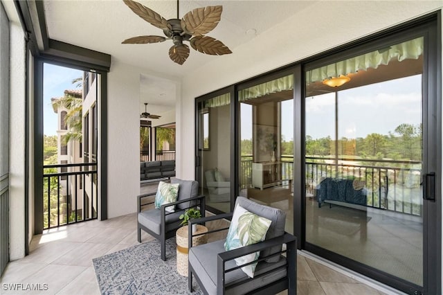 2768 Tiburon Blvd E Unit 202, Naples, FL 34109 - sunroom / solarium featuring a ceiling fan and plenty of natural light