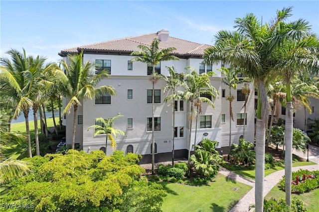 2768 Tiburon Blvd E Unit 202, Naples, FL 34109 - view of building exterior with a water view