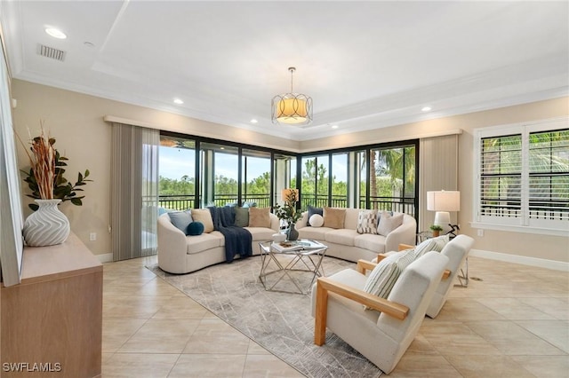 2768 Tiburon Blvd E Unit 202, Naples, FL 34109 - living room with ornamental molding, light tile patterned flooring, recessed lighting, and baseboards