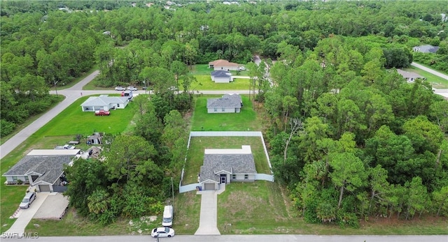 3214 45th St W, Lehigh Acres, FL 33971 - aerial overview of property's location with a forest
