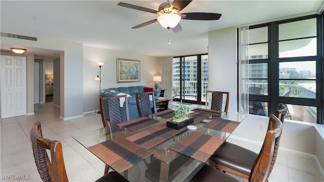 440 Seaview Ct Unit 611, Marco Island, FL 34145 - dining room featuring floor to ceiling windows, ceiling fan, and light tile patterned floors
