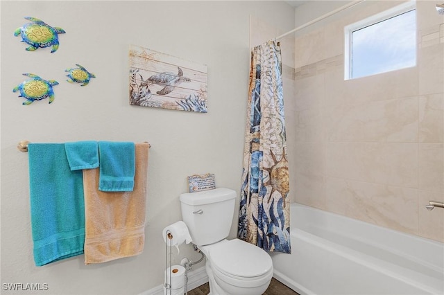 2220 Isle Of Pines Ave, Fort Myers, FL 33905 - full bathroom with toilet, shower / bath combo, and baseboards