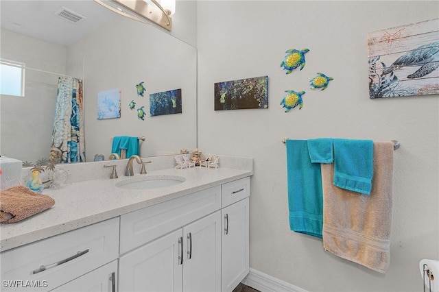 2220 Isle Of Pines Ave, Fort Myers, FL 33905 - bathroom with vanity and a shower with curtain