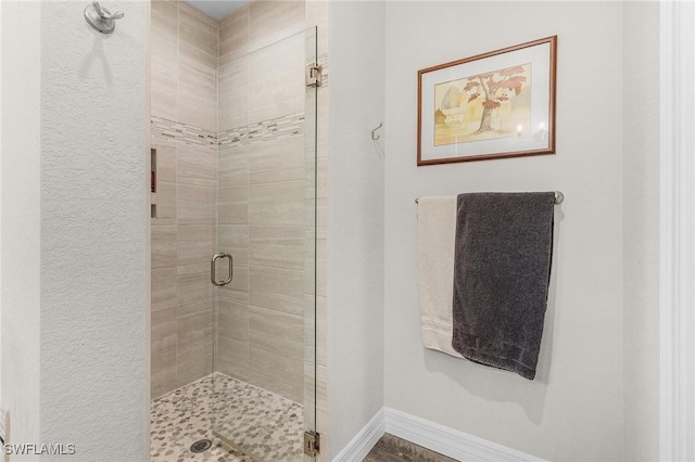 2220 Isle Of Pines Ave, Fort Myers, FL 33905 - full bathroom featuring a shower stall and baseboards