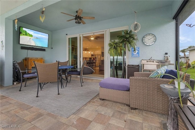 2220 Isle Of Pines Ave, Fort Myers, FL 33905 - view of patio with a ceiling fan and outdoor dining area
