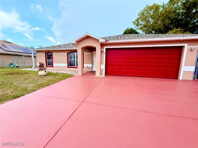 29 Alabama Rd N, Lehigh Acres, FL 33936 - single story home featuring stucco siding, a garage, and concrete driveway