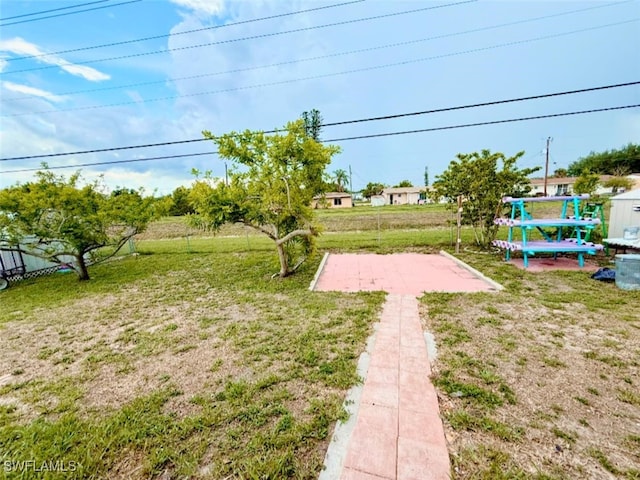 29 Alabama Rd N, Lehigh Acres, FL 33936 - view of green lawn