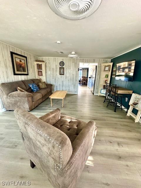 261 Redlin St, North Fort Myers, FL 33903 - living area featuring wood finished floors