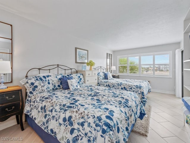 1019 Anglers Cv Unit F302, Marco Island, FL 34145 - bedroom with baseboards