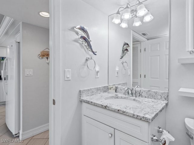 1019 Anglers Cv Unit F302, Marco Island, FL 34145 - bathroom with vanity and tile patterned flooring