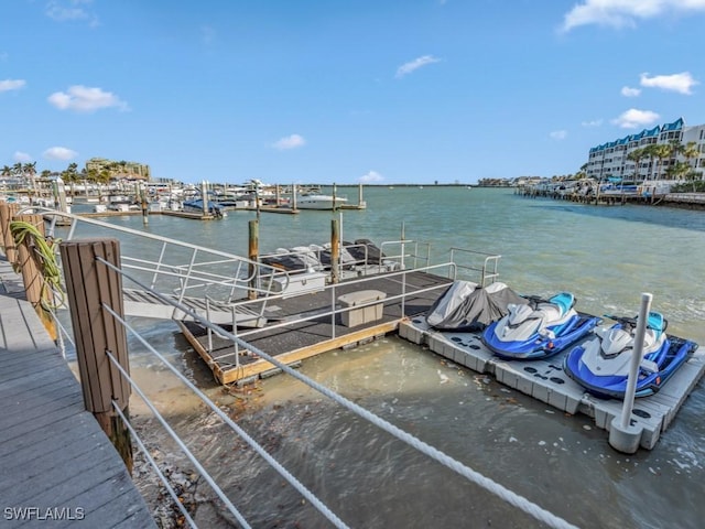 1019 Anglers Cv Unit F302, Marco Island, FL 34145 - dock featuring a water view