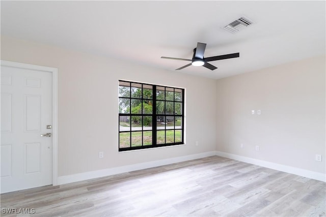 4779 31st Pl SW, Naples, FL 34116 - unfurnished room with light wood finished floors, a ceiling fan, and baseboards
