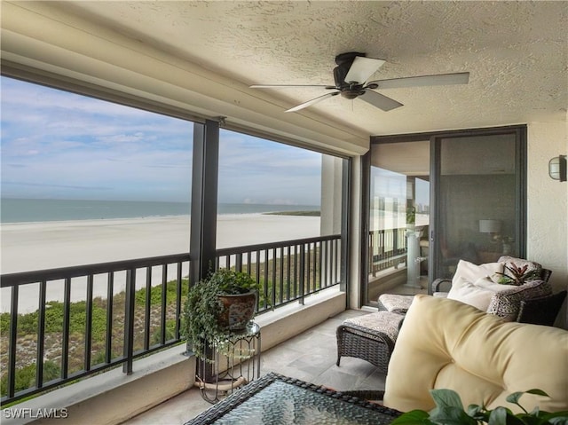 100 N Collier Blvd Unit 803, Marco Island, FL 34145 - balcony with view of water and beach and a ceiling fan