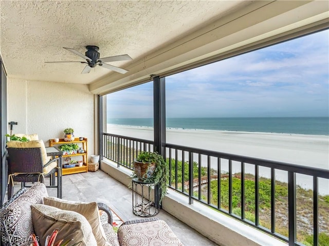 100 N Collier Blvd Unit 803, Marco Island, FL 34145 - balcony featuring a ceiling fan and view of water and beach